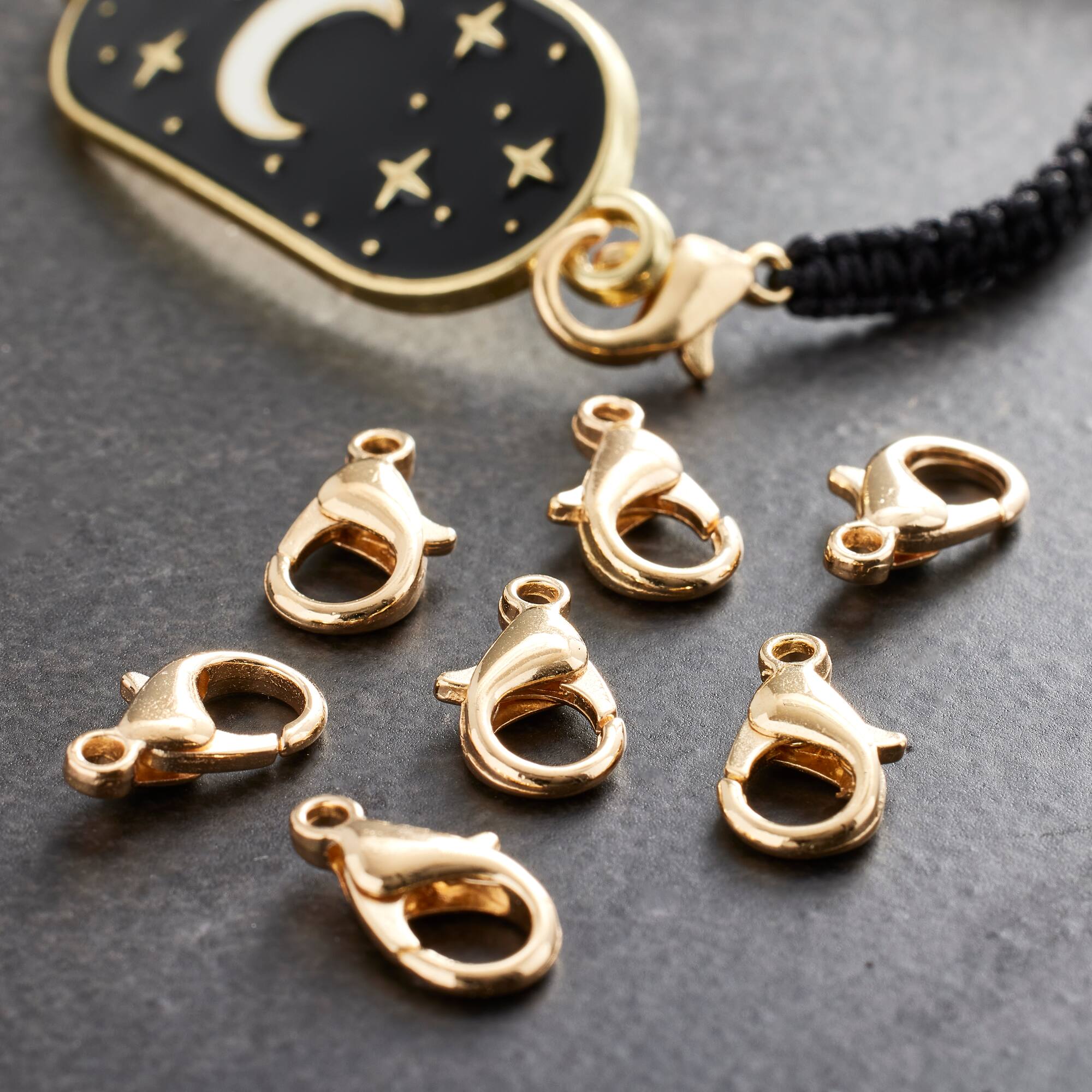 12 Pack: Gold Lobster Claw Clasps, 15mm by Bead Landing™